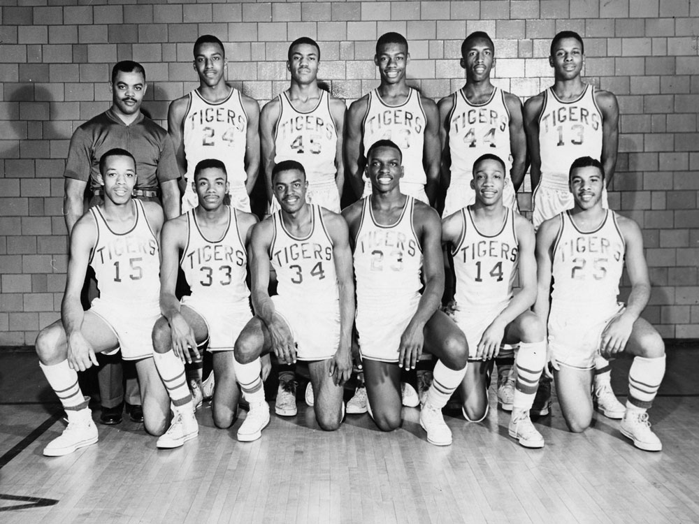 Black and white photo of the Crispus Attucks Tigers boys basketball team.